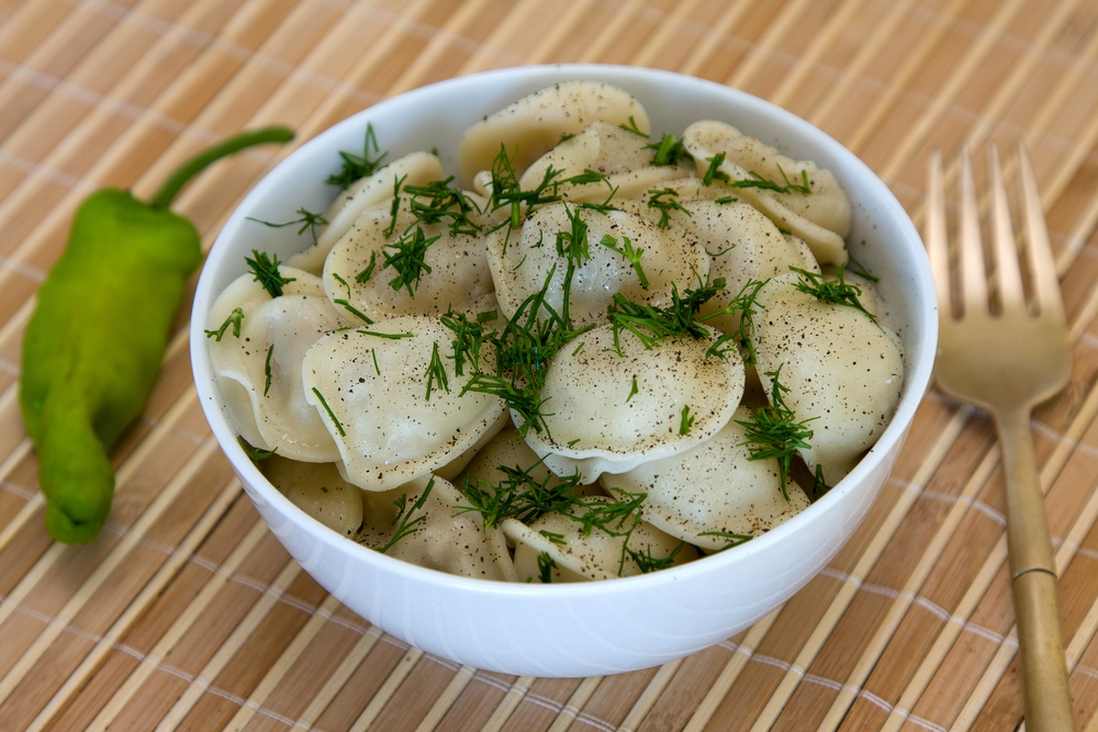 Dumpling plate with garlic and dill